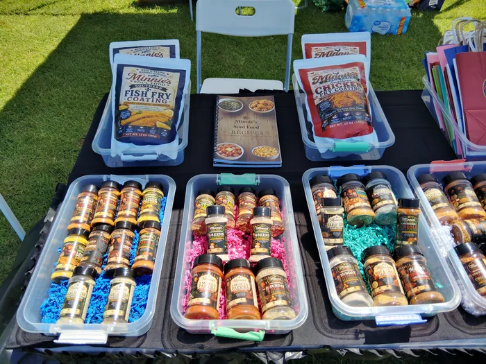 Rows of Minnie's seasoning bottles arranged by blend