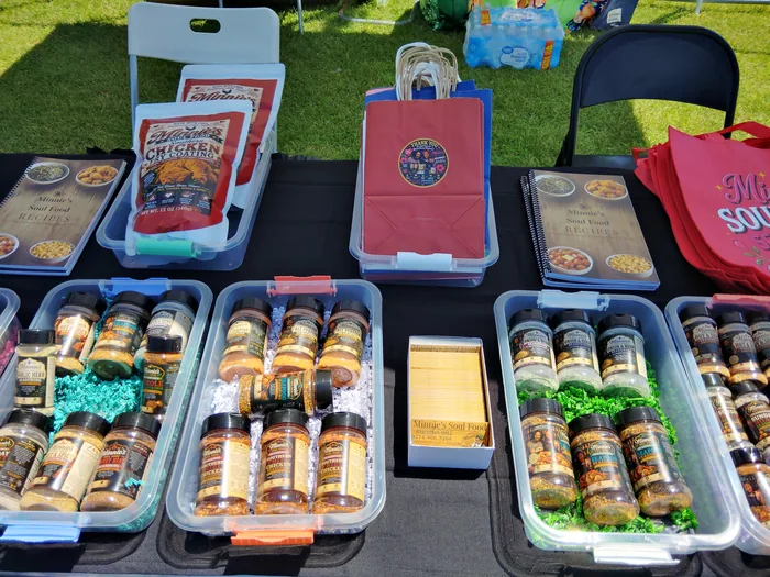 Seasoning bottles alongside branded bags and fry coating packets